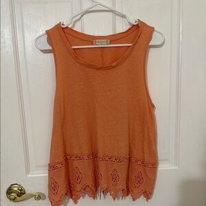 Altar’d state orange flowy/flare tank top with detail at bottom
